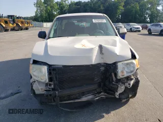 2010 Ford Escape XLS with VIN 1FMCU0C76AKB82752, listed as a Copart auction lot 57626565 with 194,931 mi miles and Salvage title. Bid and sale history available at DreamBid. Image 5.