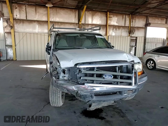 1999 Ford F-250 XL with VIN 1FTNX20FXXEE59499, listed as a Copart auction lot 87511735 with 215,520 mi miles and Salvage title. Bid and sale history available at DreamBid. Image 10.