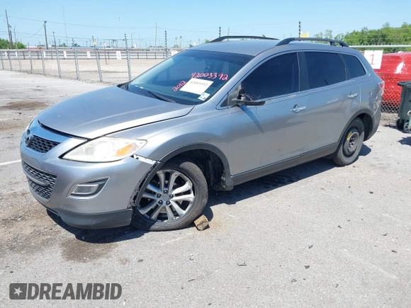 2012 Mazda CX-9 Grand Touring with VIN JM3TB2DA8C0362076, listed as a IAAI auction lot 42003392 with 125,927 mi miles. Bid and sale history available at carsss.com. Image 2.