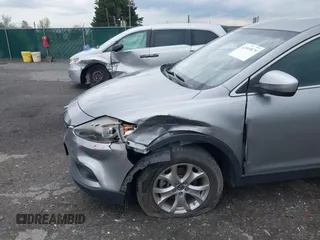 2015 Mazda CX-9 Sport with VIN JM3TB3BV2F0454770, listed as a IAAI auction lot 42009879 with 98,916 mi miles and . Bid and sale history available at carsss.com. Image 6.