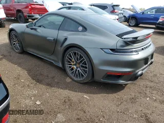 2023 Porsche 911 Turbo z VIN WP0AD2A99PS257416, wystawiony jako Copart lot #54127325 z przebiegiem 7 252 mil mil oraz Szkoda całkowita • Salvage title. Historia ofert i sprzedaży dostępna na DreamBid. Obrazek 2.
