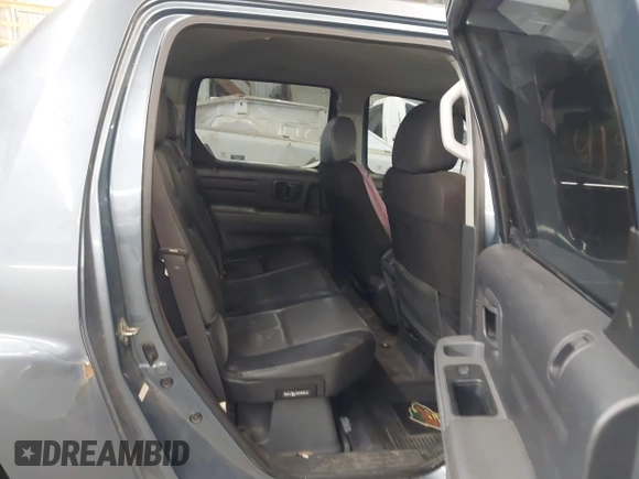 2006 Honda Ridgeline RTL with VIN 2HJYK16556H508101, listed as a IAAI auction lot 41909651 with 301,945 mi miles. Bid and sale history available at carsss.com. Image 8.