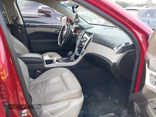 2015 Cadillac SRX z VIN 3GYFNAE3XFS572970, wystawiony jako IAAI lot #40854902 z przebiegiem 124 779 mil mil oraz . Historia ofert i sprzedaży dostępna na DreamBid. Obrazek 5.