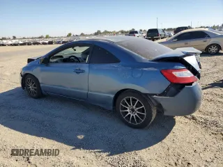 2007 Honda Civic Cpe LX with VIN 2HGFG12657H563632, listed as a Copart auction lot 73558664 with 166,144 mi miles and Salvage Title. Bid and sale history available at carsss.com. Image 2.
