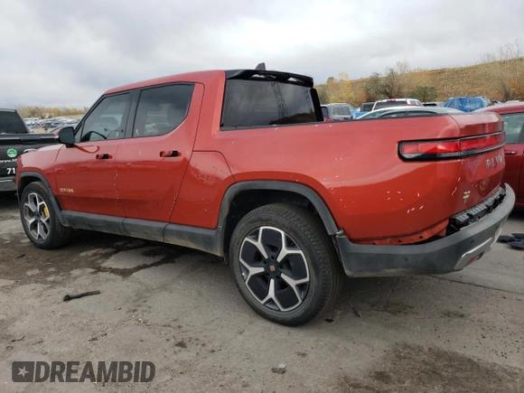2023 Rivian R1T Adventure with VIN 7FCTGAAA2PN026211, listed as a Copart auction lot 77705414 with Not Provided miles and Salvage Title. Bid and sale history available at DreamBid. Image 2.