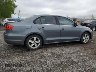 2014 Volkswagen Jetta Comfortline with VIN 3VWDL7AJ2EM399732, listed as a Copart auction lot 55946795 with 198,723 mi miles and Clean title. Bid and sale history available at DreamBid. Image 3.