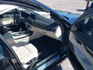 2018 BMW 7 Series 750i with VIN WBA7F0C54JGM22900, listed as a IAAI auction lot 41673673 with 66,264 mi miles. Bid and sale history available at carsss.com. Image 5.