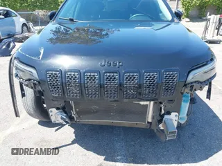 2020 Jeep Cherokee Latitude Plus with VIN 1C4PJMLB8LD563861, listed as a IAAI auction lot 41973359 with 62,234 mi miles and . Bid and sale history available at DreamBid. Image 6.