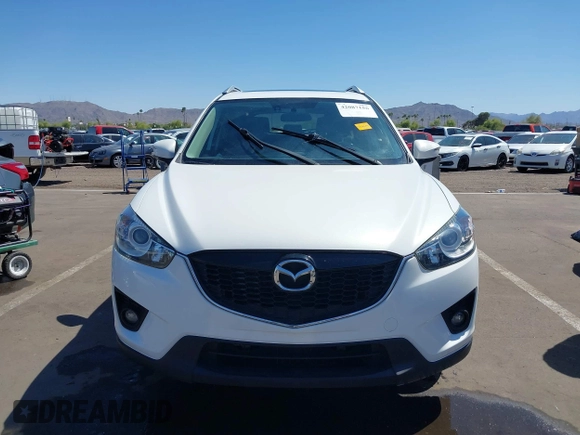 2015 Mazda CX-5 Grand Touring with VIN JM3KE2DYXF0493370, listed as a IAAI auction lot 42087156 with 161,464 mi miles. Bid and sale history available at carsss.com. Image 12.