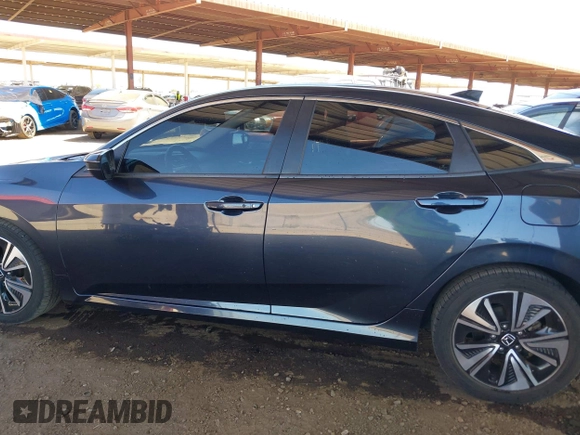 2018 Honda Civic EX-L z VIN JHMFC1F8XJX033602, wystawiony jako IAAI lot #42161015 z przebiegiem 99 597 mil mil oraz . Historia ofert i sprzedaży dostępna na DreamBid. Obrazek 14.