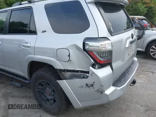 2021 Toyota 4Runner SR5 Premium with VIN JTENU5JR9M5930584, listed as a IAAI auction lot 42377592 with 58,340 mi miles and . Bid and sale history available at DreamBid. Image 6.