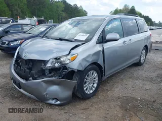 2015 Toyota Sienna XLE with VIN 5TDYK3DC7FS659864, listed as a IAAI auction lot 41958112 with 121,257 mi miles and . Bid and sale history available at DreamBid. Image 20.