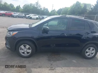 2021 Chevrolet Trax LT with VIN KL7CJPSM5MB374551, listed as a IAAI auction lot 42433565 with 54,367 mi miles and . Bid and sale history available at DreamBid. Image 14.