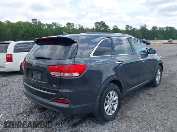 2017 Kia Sorento LX with VIN 5XYPG4A3XHG264438, listed as a IAAI auction lot 42135558 with 112,829 mi miles. Bid and sale history available at carsss.com. Image 4.