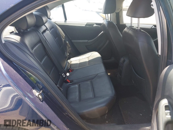 2014 Volkswagen Jetta SE z VIN 3VWD17AJ1EM303577, wystawiony jako IAAI lot #42436160 z przebiegiem 113 086 mil mil oraz . Historia ofert i sprzedaży dostępna na DreamBid. Obrazek 8.