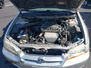 1999 Honda Accord LX with VIN JHMCG6650XC011621, listed as a IAAI auction lot 42401527 with 243,227 mi miles and . Bid and sale history available at DreamBid. Image 10.