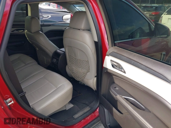 2015 Cadillac SRX z VIN 3GYFNAE3XFS572970, wystawiony jako IAAI lot #40854902 z przebiegiem 124 779 mil mil oraz . Historia ofert i sprzedaży dostępna na DreamBid. Obrazek 8.