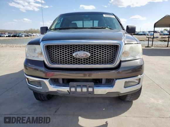 2005 Ford F-150 XLT with VIN 1FTPX12575NB60735, listed as a Copart auction lot 49598075 with 153,360 mi miles and Salvage title. Bid and sale history available at DreamBid. Image 5.