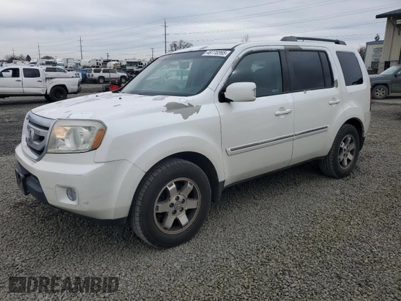 2011 Honda Pilot Touring with VIN 5FNYF4H9XBB066264, listed as a Copart auction lot 48770365 with 201,326 mi miles and Clean Title. Bid and sale history available at DreamBid. Image 1.