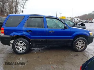 2005 Ford Escape XLT with VIN 1FMCU93125KA41795, listed as a IAAI auction lot 41931869 with 156,421 mi miles and . Bid and sale history available at DreamBid. Image 13.