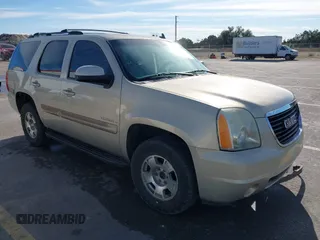 2007 GMC Yukon SLT with VIN 1GKFC13037R334763, listed as a IAAI auction lot 41299671 with 219,227 mi miles. Bid and sale history available at carsss.com. Image 1.