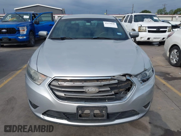 2015 Ford Taurus SEL z VIN 1FAHP2E88FG133328, wystawiony jako IAAI lot #42179649 z przebiegiem 127 171 mil mil oraz . Historia ofert i sprzedaży dostępna na DreamBid. Obrazek 12.