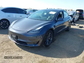 2023 Tesla Model 3 with VIN 5YJ3E1EA7PF447409, listed as a IAAI auction lot 41965416 with 40,033 mi miles and . Bid and sale history available at DreamBid. Image 2.