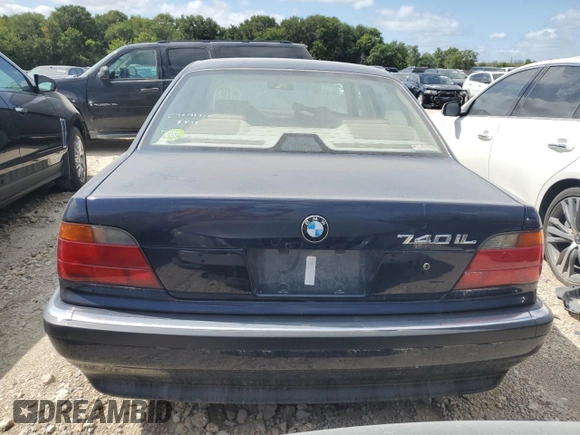 1997 BMW 7 Series 740il with VIN WBAGJ8324VDM02317, listed as a Copart auction lot 64879564 with 107,365 mi miles and Salvage Title. Bid and sale history available at carsss.com. Image 6.
