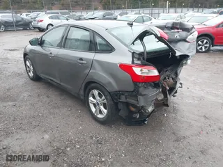 2014 Ford Focus SE with VIN 1FADP3F22EL110079, listed as a IAAI auction lot 41461344 with 201,230 mi miles. Bid and sale history available at carsss.com. Image 3.
