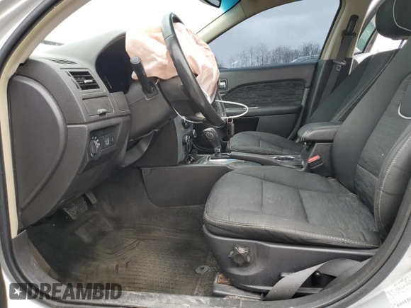 2012 Ford Fusion SE with VIN 3FAHP0HA1CR202982, listed as a Copart auction lot 52517915 with 189,475 mi miles and Salvage Title. Bid and sale history available at DreamBid. Image 7.