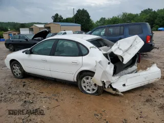 2007 Ford Taurus SE z VIN 1FAFP53U87A138588, wystawiony jako Copart lot #56965245 z przebiegiem Nie podano mil oraz Szkoda całkowita • Salvage title. Historia ofert i sprzedaży dostępna na DreamBid. Obrazek 2.
