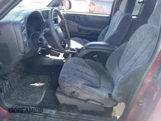 2001 GMC Sonoma SLS 1SG z VIN 1GTCS19W918225024, wystawiony jako Copart lot #49043895 z przebiegiem 140 616 mil mil oraz Szkody całkowita. Historia ofert i sprzedaży dostępna na DreamBid. Obrazek 7.