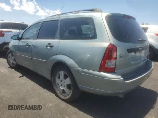 2004 Ford Focus SE with VIN 1FAFP36384W191801, listed as a Copart auction lot 63661465 with 144,226 mi miles and Salvage title. Bid and sale history available at DreamBid. Image 2.