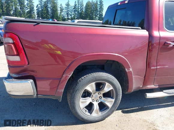 2019 Ram 1500 Laramie with VIN 1C6SRFJT2KN677400, listed as a IAAI auction lot 42441010 with 76,750 mi miles and . Bid and sale history available at DreamBid. Image 18.