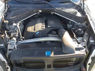 2011 BMW X5 35i with VIN 5UXZV4C52BL410497, listed as a IAAI auction lot 41995459 with 162,781 mi miles. Bid and sale history available at carsss.com. Image 10.