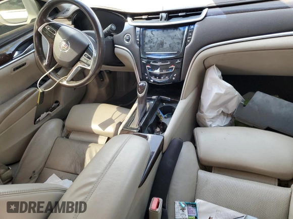2014 Cadillac XTS Premium with VIN 2G61P5S36E9305491, listed as a Copart auction lot 44404425 with 104,710 mi miles and Salvage Title. Bid and sale history available at DreamBid. Image 8.