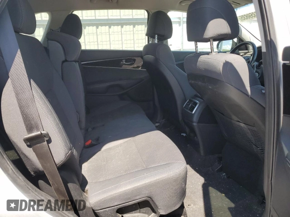 2017 Kia Sorento LX z VIN 5XYPGDA3XHG236574, wystawiony jako Copart lot #56359835 z przebiegiem 105 297 mil mil oraz Szkoda całkowita • Salvage title. Historia ofert i sprzedaży dostępna na DreamBid. Obrazek 11.
