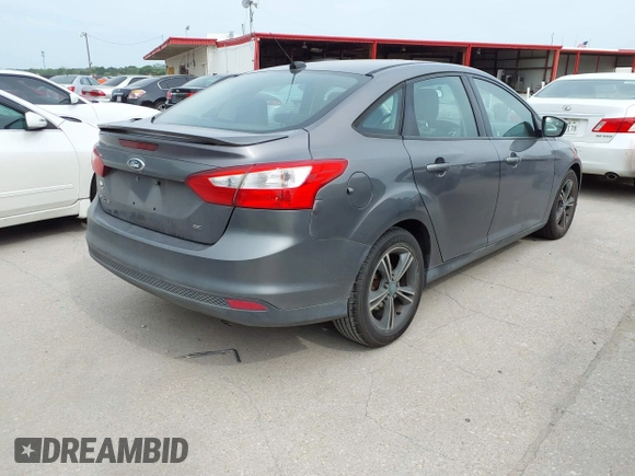 2012 Ford Focus SE with VIN 1FAHP3F25CL122340, listed as a IAAI auction lot 42070565 with 186,662 mi miles. Bid and sale history available at carsss.com. Image 4.