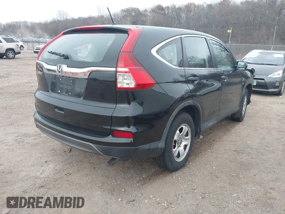 2015 Honda CR-V LX with VIN 2HKRM3H35FH501019, listed as a IAAI auction lot 41014683 with 111,168 mi miles and . Bid and sale history available at carsss.com. Image 4.