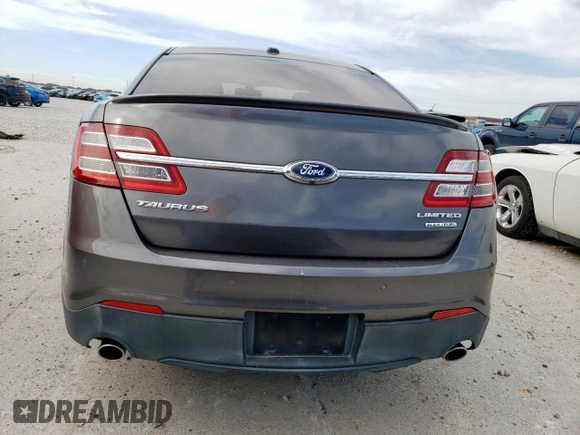2013 Ford Taurus Limited z VIN 1FAHP2F89DG187913, wystawiony jako Copart lot #57096865 z przebiegiem 93 575 mil mil oraz Szkoda całkowita • Salvage title. Historia ofert i sprzedaży dostępna na DreamBid. Obrazek 6.