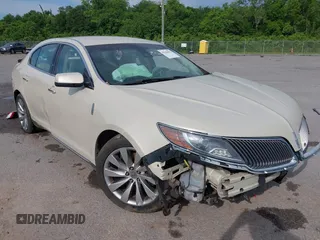 2014 Lincoln MKS z VIN 1LNHL9DK3EG601794, wystawiony jako IAAI lot #42156812 z przebiegiem 192 010 mil mil oraz . Historia ofert i sprzedaży dostępna na DreamBid. Obrazek 1.