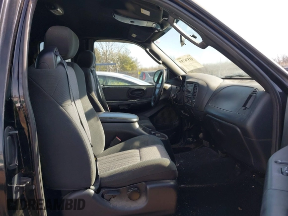 2003 Ford F-150 XL with VIN 1FTRX17W53NB00671, listed as a IAAI auction lot 41576739 with 194,066 mi miles. Bid and sale history available at carsss.com. Image 5.