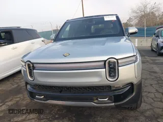 2025 Rivian R1S Adventure z VIN 7PDSGBBA2SN058678, wystawiony jako IAAI lot #41429201 z przebiegiem 2 322 mil mil oraz . Historia ofert i sprzedaży dostępna na DreamBid. Obrazek 13.