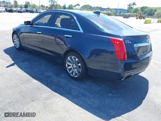 2016 Cadillac CTS Sedan RWD with VIN 1G6AP5SX8G0119984, listed as a IAAI auction lot 41679567 with 98,592 mi miles. Bid and sale history available at carsss.com. Image 3.
