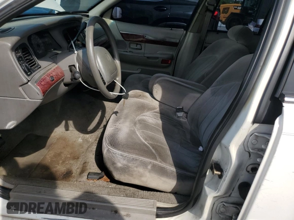 2000 Mercury Grand Marquis GS z VIN 2MEFM74WXYX699560, wystawiony jako Copart lot #57721925 z przebiegiem 246 297 mil mil oraz Szkoda całkowita • Salvage title. Historia ofert i sprzedaży dostępna na DreamBid. Obrazek 7.