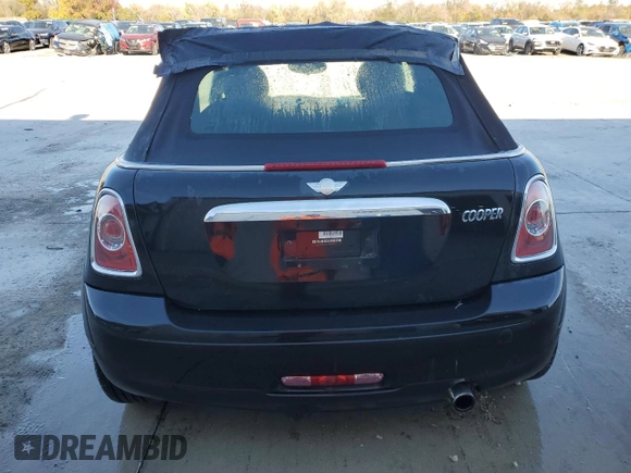 2011 MINI Convertible с VIN WMWZN3C55BTZ89445, выставлен на аукционе Copart как лот 78996404 с пробегом 71 821 миль миль и Списание • Salvage title. История ставок и продаж доступна на DreamBid. Изображение 6.