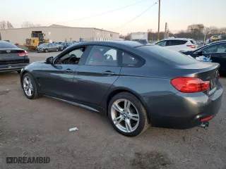 2015 BMW 4 Series 428i xDrive with VIN WBA4C9C5XFD330974, listed as a Copart auction lot 80738054 with 130,644 mi miles and Salvage Title. Bid and sale history available at carsss.com. Image 2.