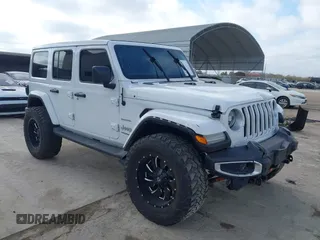 2021 Jeep Wrangler Unlimited Sahara z VIN 1C4HJXEN3MW717895, wystawiony jako IAAI lot #41472929 z przebiegiem 58 001 mil mil oraz . Historia ofert i sprzedaży dostępna na DreamBid. Obrazek 1.