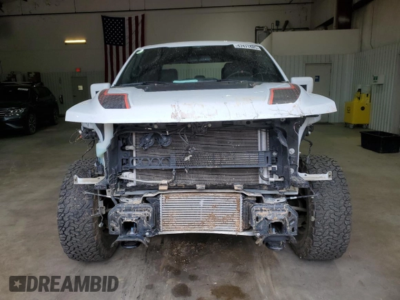 2023 Ford F-150 Raptor with VIN 1FTFW1RG5PFB97799, listed as a Copart auction lot 47471485 with 27,282 mi miles and Salvage Title. Bid and sale history available at DreamBid. Image 5.