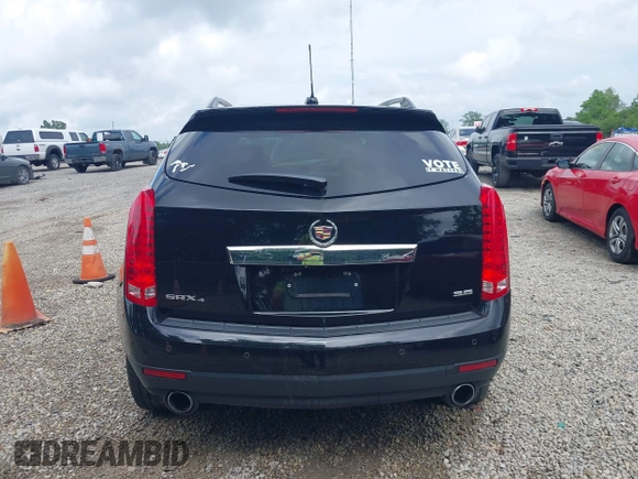 2015 Cadillac SRX Premium Collection z VIN 3GYFNGE36FS626641, wystawiony jako IAAI lot #42532380 z przebiegiem 178 799 mil mil oraz . Historia ofert i sprzedaży dostępna na DreamBid. Obrazek 16.